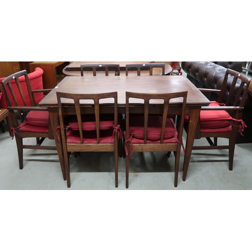 118 - A mid 20th century teak extending dining table and six chairs, table is 77cm high x 128cm long (208c... 