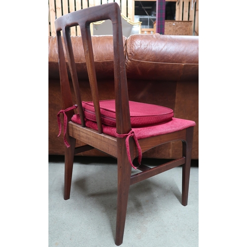 118 - A mid 20th century teak extending dining table and six chairs, table is 77cm high x 128cm long (208c... 