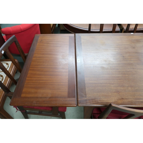 118 - A mid 20th century teak extending dining table and six chairs, table is 77cm high x 128cm long (208c... 