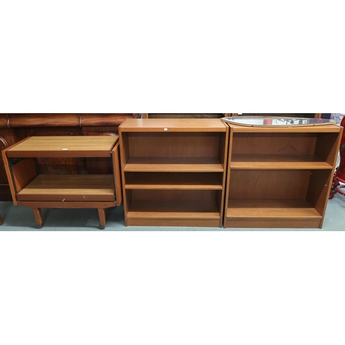 121 - A lot comprising pair of mid 20th century teak bookcases, a teak two tier metamorphic tea trolley an... 