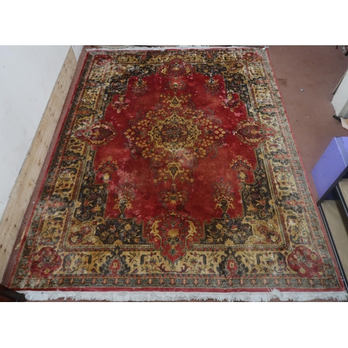 123 - A red ground Keshan rug with cream central medallion, matching spandrels and borders, 353cm long x 2... 