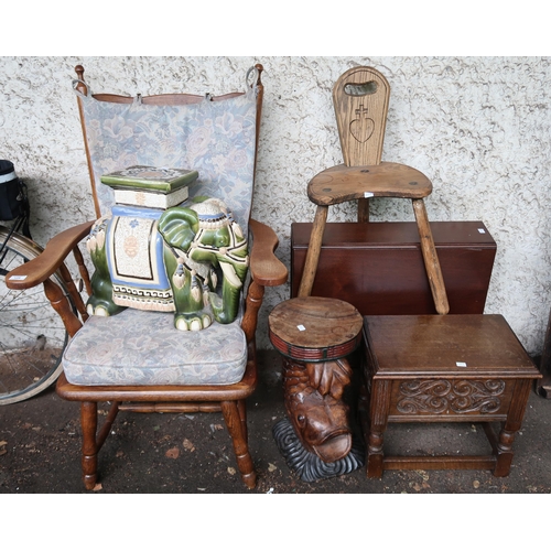 128 - A mixed lot to include elm rail back arm chair, ceramic elephant garden jardiniere, carved koi occas... 