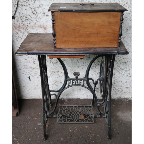 129 - A 20th century Pfaff cast iron based treadle sewing machine, 100cm high x 74cm wide x 43cm deep