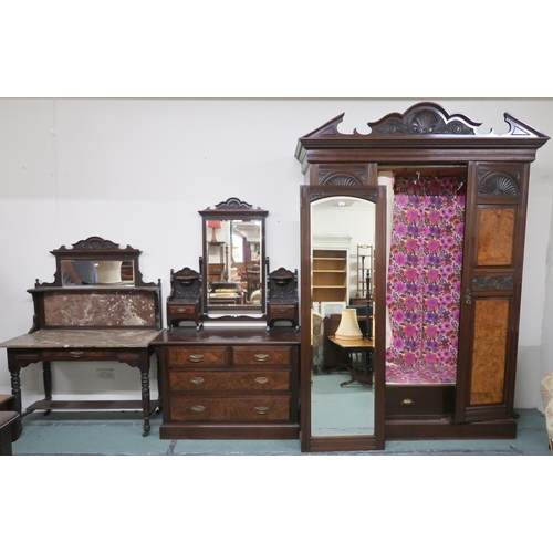 151 - A Victorian mahogany and burr walnut veneered bedroom suite comprising triple door wardrobe, 238cm h... 