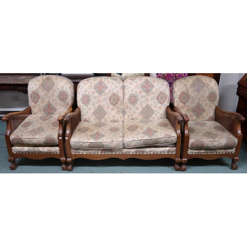 152 - A 20th century three piece bergere suite, with carved claw arms, comprising two seater settee, 87cm ... 