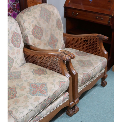 152 - A 20th century three piece bergere suite, with carved claw arms, comprising two seater settee, 87cm ... 