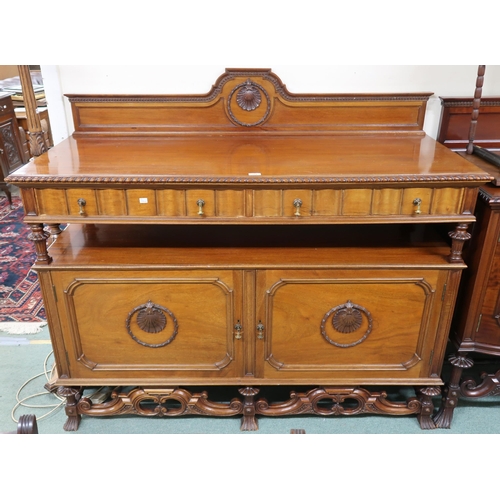 164 - A 20th century mahogany sideboard with two long drawers over pair of cabinet doors with a further do... 