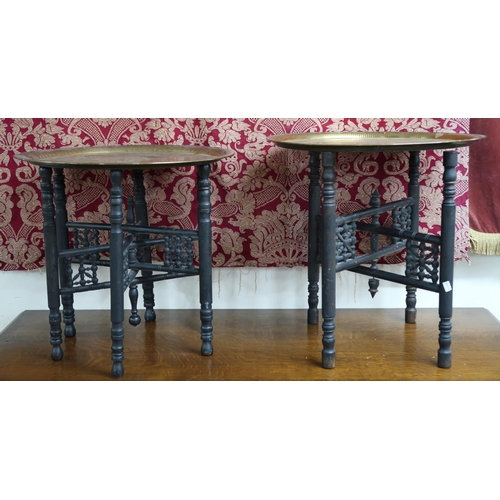 172 - A lot of two Oriental style brass topped folding tables (2)