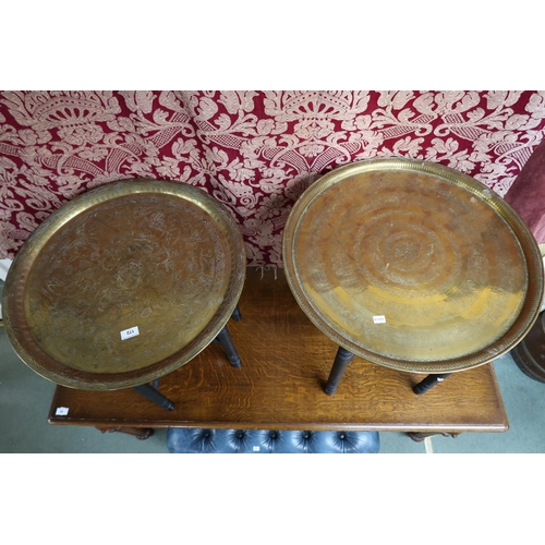 172 - A lot of two Oriental style brass topped folding tables (2)