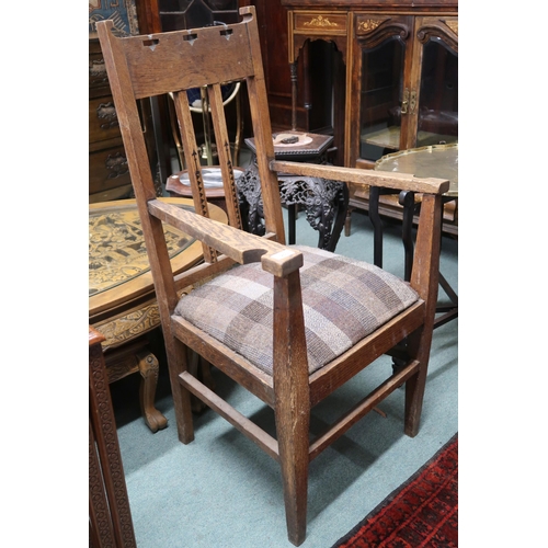 20 - A late Victorian oak Arts & Crafts style open armchair with shaped top rail over inlaid rail bac... 