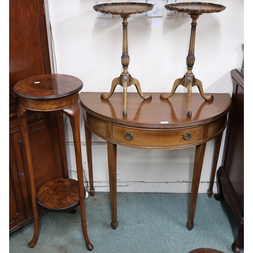 34 - An early 20th century demilune single drawer side table, walnut two tier plant stand and a pair of w... 