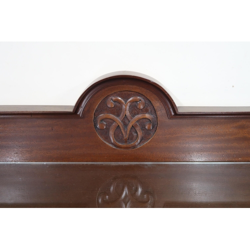 35 - A 20th century mahogany sideboard with three central drawers flanked by cabinet doors on cabriole fe... 