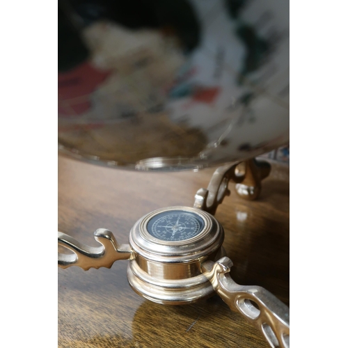 4 - A 20th century brass framed stone inlaid countertop globe 