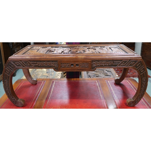 41 - A 20th century Chinese hardwood single drawer coffee table with carved top on bowed supports, 39cm h... 