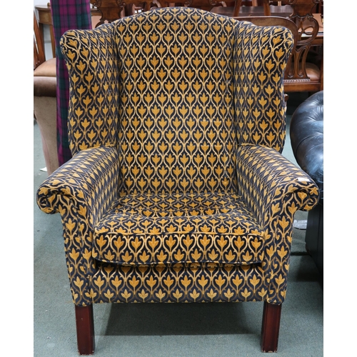 54 - A large 20th century Georgian style open armchair with foliate upholstery on square supports, 110cm ... 