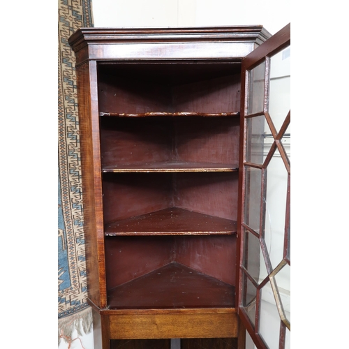 6 - A late Victorian astragal glazed corner cabinet (cracks to glass door), 177cm high x 74cm wide 