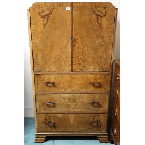 66 - An early 20th century Art Deco burr walnut veneered gents robe with pair of cabinet doors over three... 