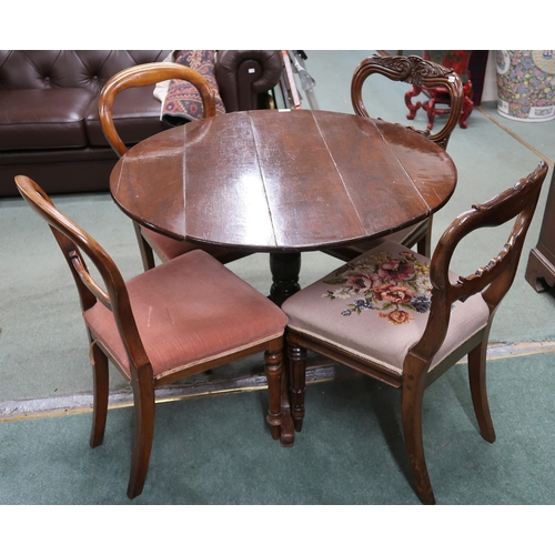 76 - A Victorian circular tilt topped breakfast table and two pairs of Victorian balloon back dining chai... 