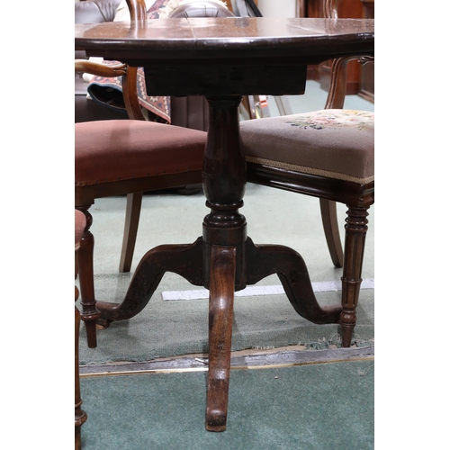 76 - A Victorian circular tilt topped breakfast table and two pairs of Victorian balloon back dining chai... 