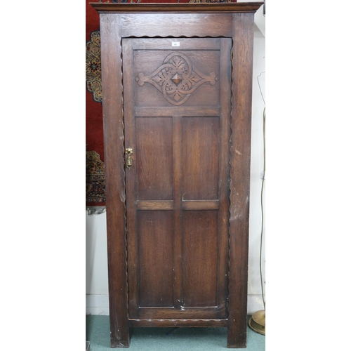 88 - A 20th century oak single door hall robe, 183cm high x 84cm wide x 42cm deep