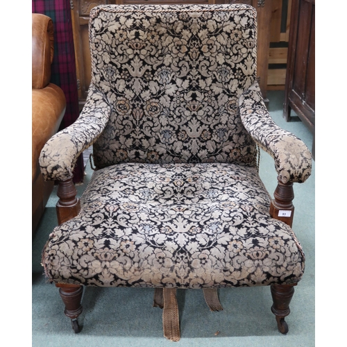 93 - A Victorian walnut framed open armchair with floral Damask upholstery on turned supports, 89cm high ... 