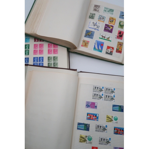 426 - A stamp collection in four albums and various loose leaf folders and note books, with Abbey Stamp Al... 