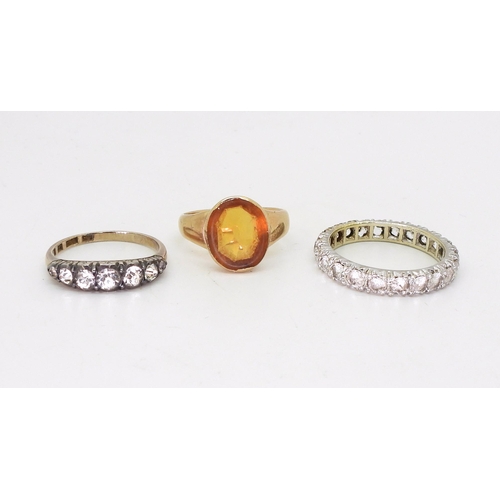 794 - A clear gem set eternity ring, set with clear gems, size S1/2, a 9ct gold five stone clear gem set r... 