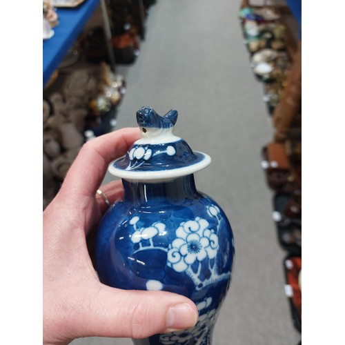 228 - A Chinese blue and white dragon decorated ginger jar, another ginger jar with figures, assorted vase... 