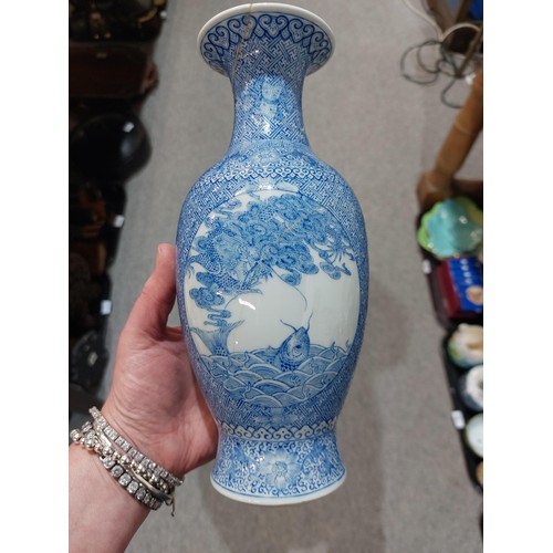 228 - A Chinese blue and white dragon decorated ginger jar, another ginger jar with figures, assorted vase... 