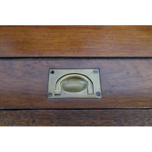 2019 - AN EARLY 20TH CENTURY SCOTTISH HALL SETTLE with three panel back rest carved with thistle motifs fla... 