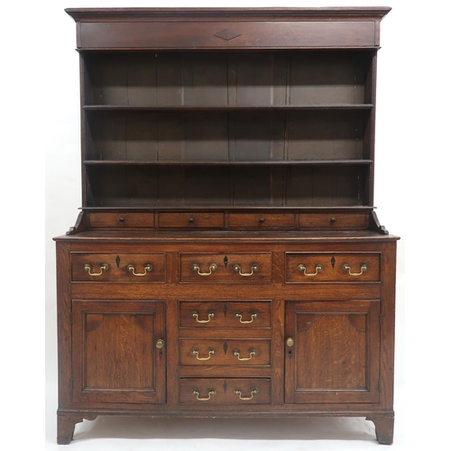 2020 - AN 18TH CENTURY OAK WELSH STYLE KITCHEN DRESSER with corniced top over three open plate shelves over... 