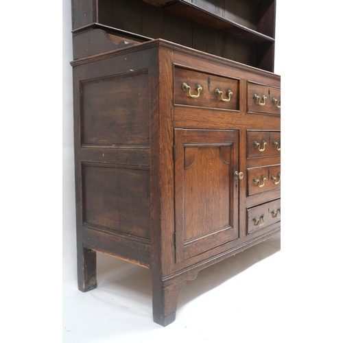 2020 - AN 18TH CENTURY OAK WELSH STYLE KITCHEN DRESSER with corniced top over three open plate shelves over... 