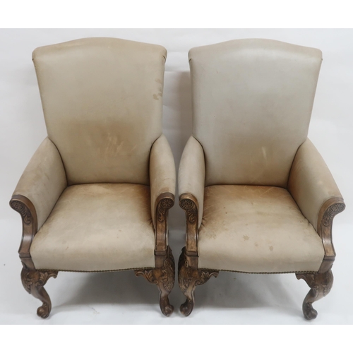 2022 - A PAIR OF 20TH CENTURY LEATHER UPHOLSTERED REPRODUCTION ARMCHAIRS with mahogany frame on scrolled su... 