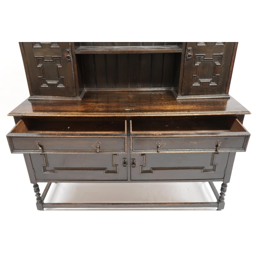 2026 - AN EARLY 19TH CENTURY OAK JACOBEAN STYLE KITCHEN DRESSER with cornice top over shaped apron above tw... 