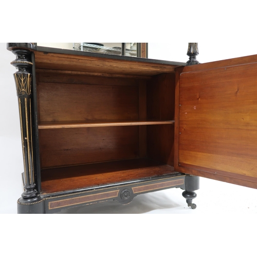 2031 - A VICTORIAN BURR WALNUT VENEERED EBONISED MUSIC CABINET with shaped top with brass mounted edges ove... 
