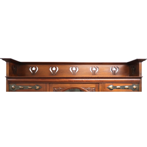 2037 - A LATE VICTORIAN MAHOGANY ARTS & CRAFTS BOOKCASE with pierced gallery top over three beaded glas... 