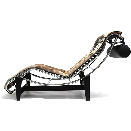 2103 - A 20TH CENTURY AFTER LE CORBUSIER TYPE LC4 CHAISE LONGUE with black leather head cushion and faux co... 
