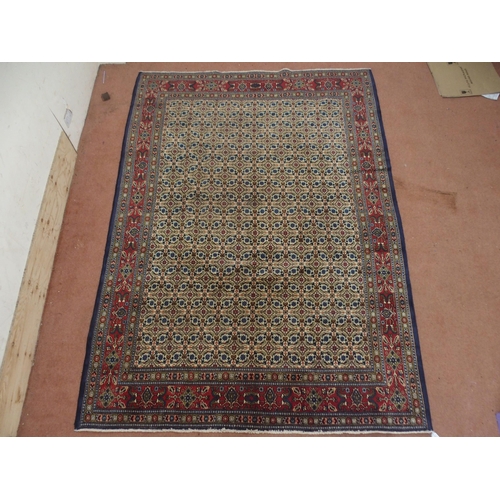 2135 - A MULTICOLOURED PATTERNED GROUND TABRIZ RUG with red patterned border, 304cm long x 214cm wide... 