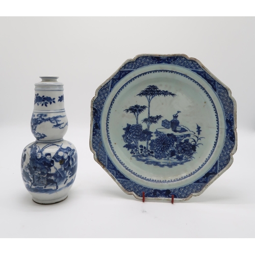 2366 - A CHINESE EXPORT BLUE AND WHITE OCTAGONAL PLATEdecorated with a landscape scene, the rim with a diap... 