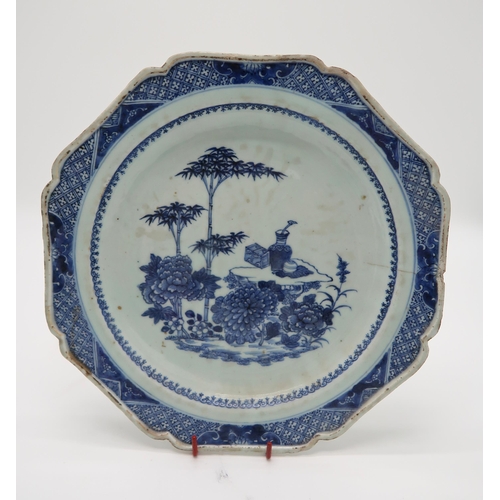 2366 - A CHINESE EXPORT BLUE AND WHITE OCTAGONAL PLATEdecorated with a landscape scene, the rim with a diap... 