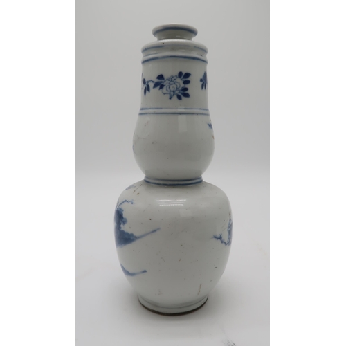 2366 - A CHINESE EXPORT BLUE AND WHITE OCTAGONAL PLATEdecorated with a landscape scene, the rim with a diap... 