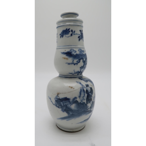 2366 - A CHINESE EXPORT BLUE AND WHITE OCTAGONAL PLATEdecorated with a landscape scene, the rim with a diap... 