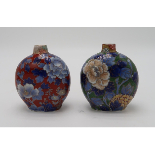 2370 - A CHINESE YIXING TEAPOTof gourd form, decorated and enamelled in relief with foliage and birds, 19.2... 