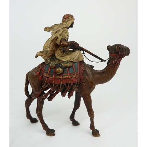 2154 - FRANZ BERGMAN (AUSTRIAN 1861-1936)A cold painted bronze figure of an Arab man, sitting on a camel an... 