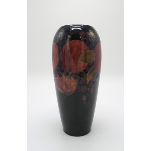 2158 - A MOORCROFT POMEGRANATE VASE of shouldered tapering form, with paper label to the base, 31cm high... 