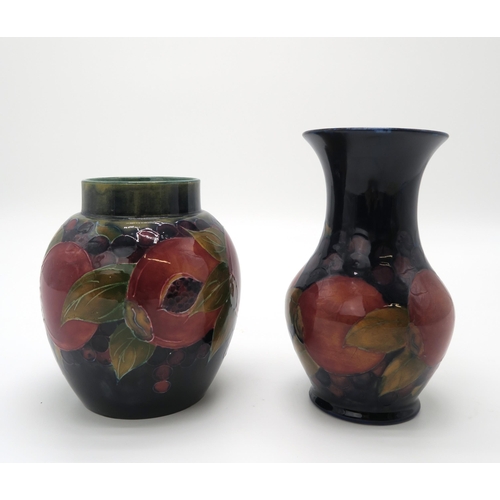 2160 - A MOORCROFT POMEGRANATE PATTERN GINGER JAR 13cm high, together with a pomegranate pattern vase, 16cm... 