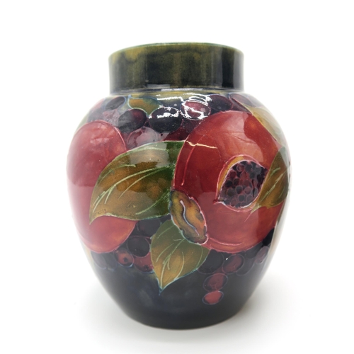 2160 - A MOORCROFT POMEGRANATE PATTERN GINGER JAR 13cm high, together with a pomegranate pattern vase, 16cm... 