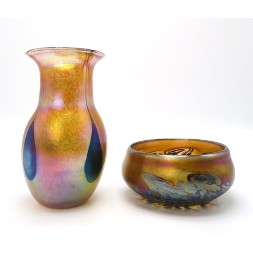 2162 - JOHN DITCHFIELD FOR GLASFORM An amber coloured glass vase with blue teardrop decoration and pink iri... 