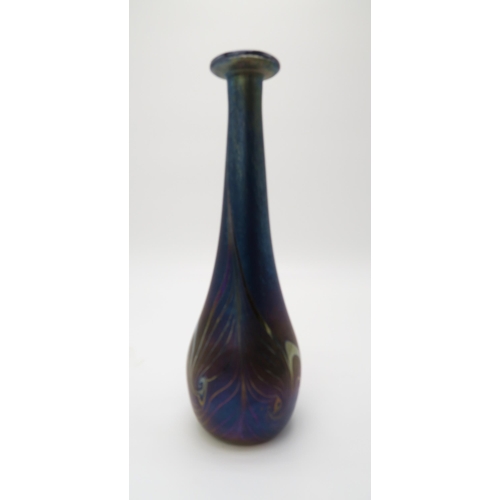 2164 - JOHN DITCHFIELD FOR GLASFORM A tapering blue glass vase with iridescent feather decoration, signed a... 