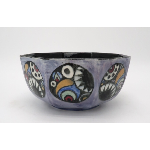 2182 - ELIZABETH MARY WATT (SCOTTISH 1886-1954)An octagonal bowl, the black ground with geometric roundels ... 